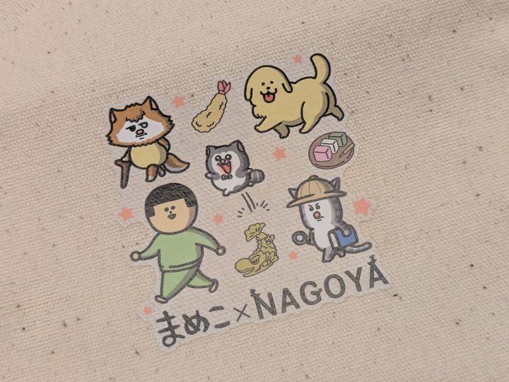 まめこ×NAGOYAオリジナルコットンポーチ デザインアップの写真